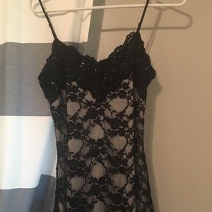 Camisole, white underneath with sheer lace overlay